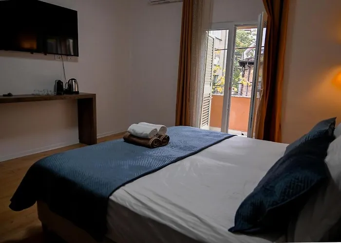 1 * Tirana